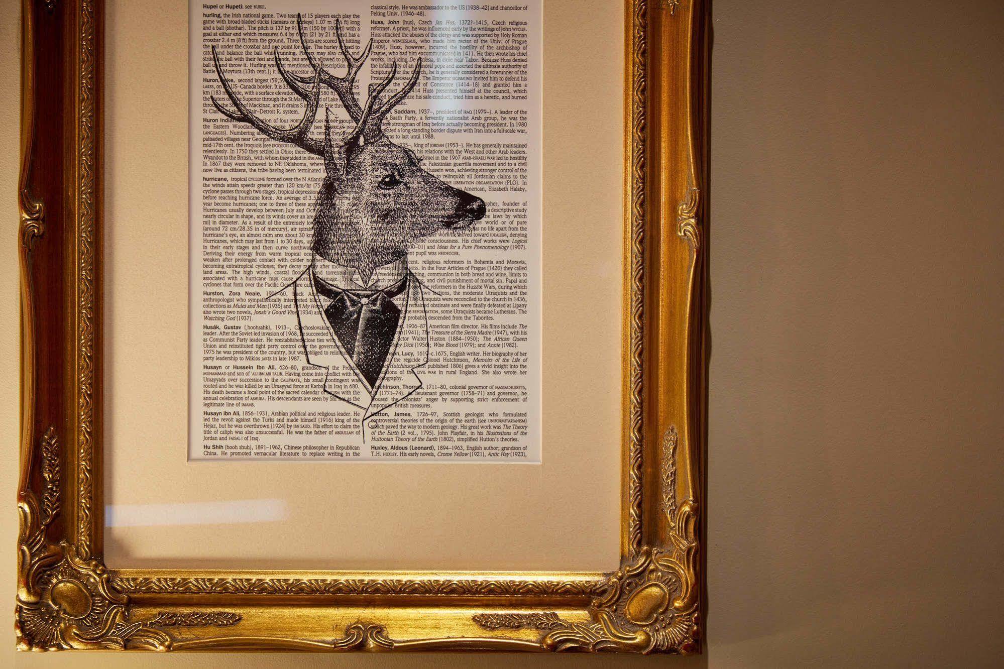 Oddfellows On The Park Чийдъл Екстериор снимка A framed print of a deer head with a bow tie
